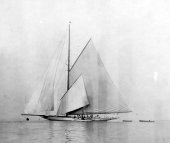 915-Shamrock III at Anchor. Hoisting Jack Yard Topsail. August 1903.