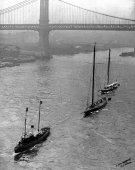 165-Shamrock III and Shamrock IV being towed to New York. 1920.