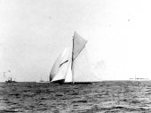 275-Shamrock II crowding on all canvas, breaks out her balloon jib topsail. 1901.