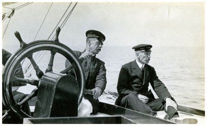 Captain Turner and Charles E. Nicholson at the helm of Shamrock IV during trials