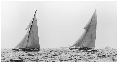 A photograph from the Edwin Levick Collection, taken by levick, of the Enterprise (right) and Shamrock V (left) during the third day of the International Yacht Race.